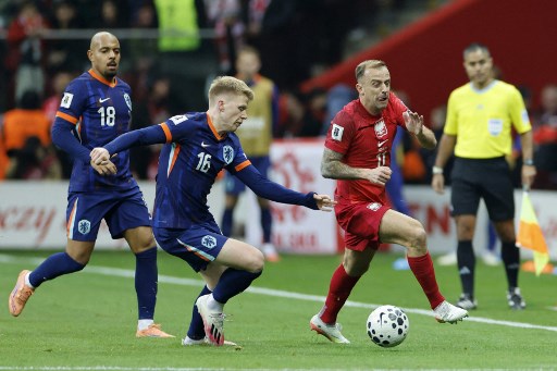 Suasana laga Polandia vs Belanda. (Wojtek RADWANSKI / AFP)