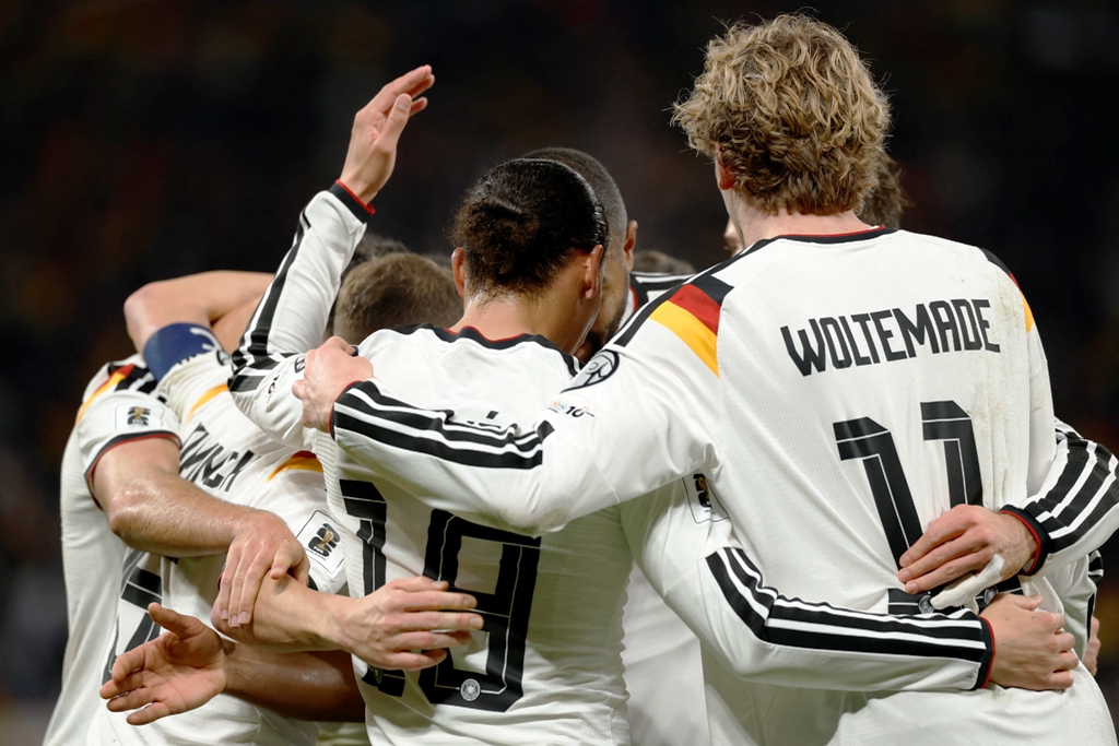 Skuat Jerman merayakan kelolosan ke Piala Dunia 2026-Foto ODD ANDERSEN / AFP