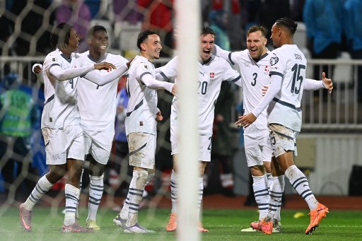 Selebrasi gol para pemain timnas Swiss. (Armend NIMANI / AFP)