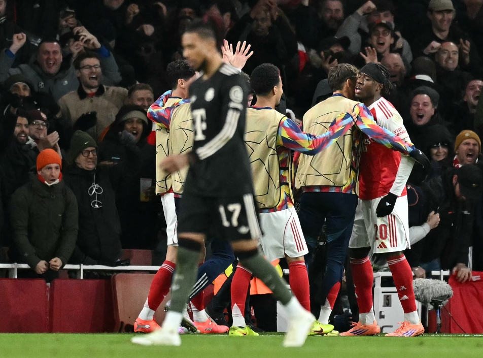 Pemain Arsenal merayakan kemenangan atas Bayern Munchen (AFP/Ben Stansall)