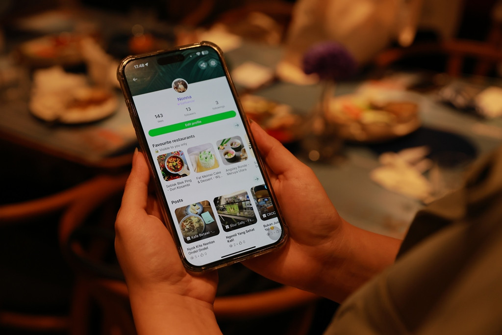 Tampilan profil pengguna Eatfluencer di fitur Grab Discover yang menampilkan kumpulan ulasan dan rekomendasi kuliner autentik dari para kreator dalam acara Grab #DareToDiscover. Dok. Ist