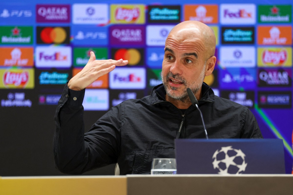 Pealtih Manchester City Pep Guardiola. (Foto: THOMAS COEX / AFP)