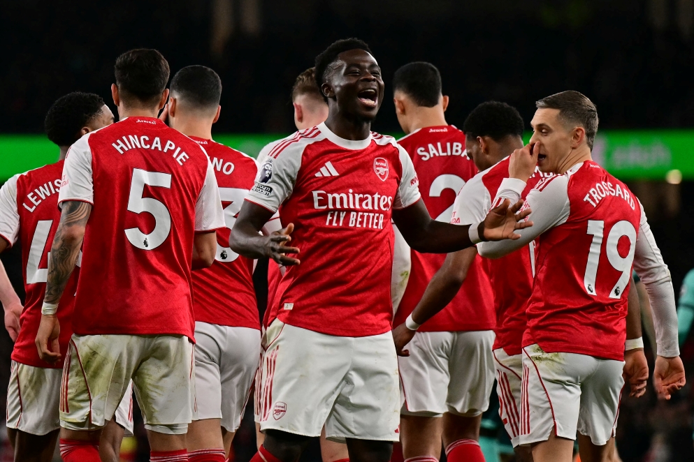 Pemain Arsenal merayakan kemenangan atas Wolves (AFP/Ben Stansall)
