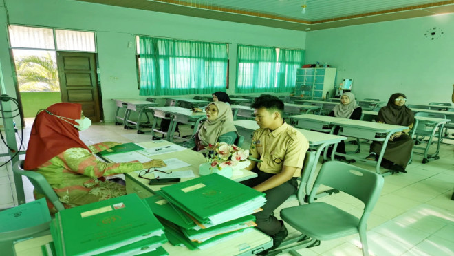 Pembagian rapor. DOK man1balam.sch.id