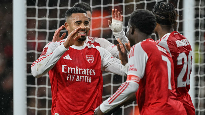 Selebrasi gol Gabriel Jesus dalam laga Arsenal vs Wigan. (Foto: GLYN KIRK / AFP)