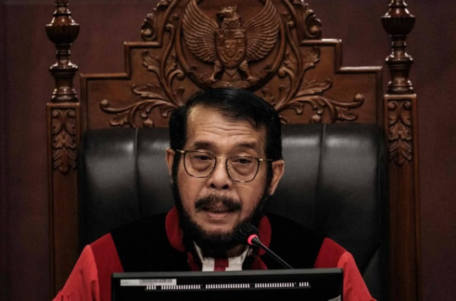 Hakim Mahkamah Konstitusi Anwar Usman. AFP/Yasuyoshi CHIBA