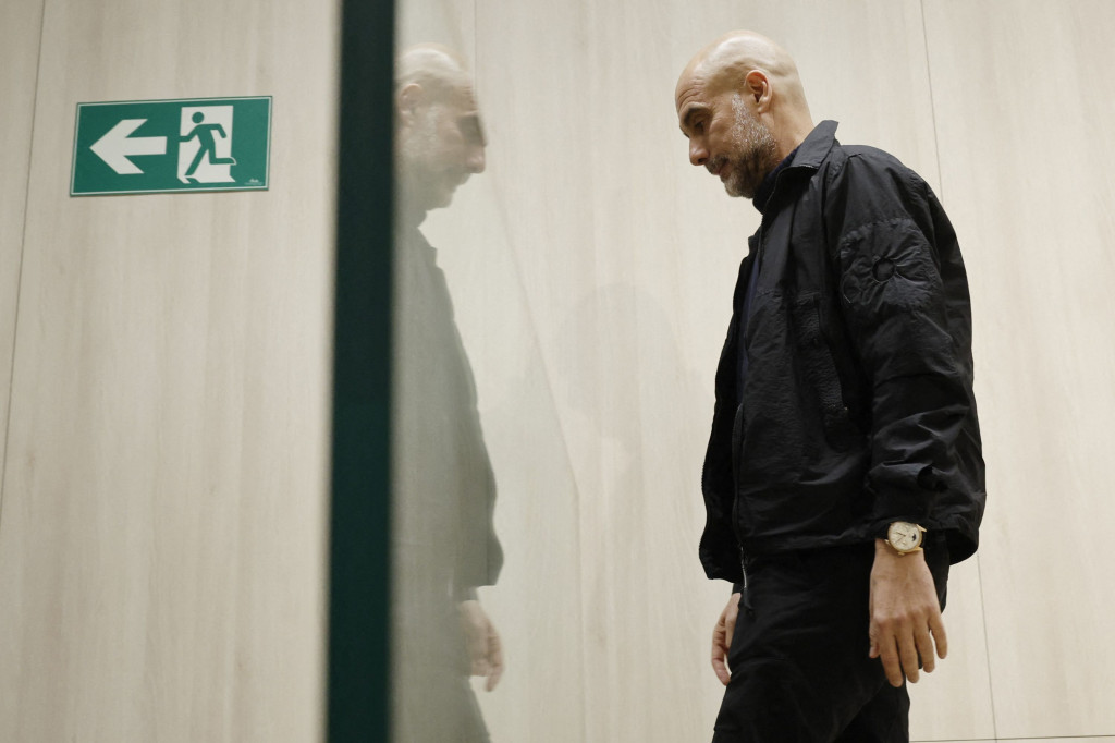Pep Guardiola. (Photo by OSCAR DEL POZO / AFP)