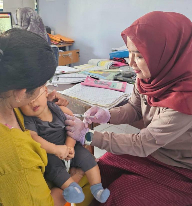   Usai kajian KIPI, Kemenkes pastikan imunisasi di Kampar tetap jalan terus. (Foto: Dok. Birkom Kemenkes) 