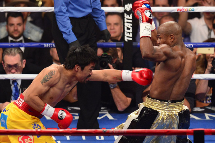 Mayweather Pertahankan Sabuk Juara dari Pacquiao