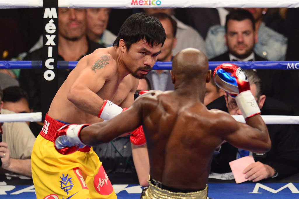 Mayweather Pertahankan Sabuk Juara dari Pacquiao
