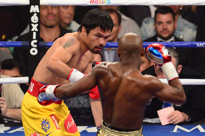 Mayweather Pertahankan Sabuk Juara dari Pacquiao