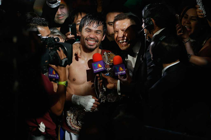 Pacquiao Kalahkan Bradley dengan Angka Mutlak