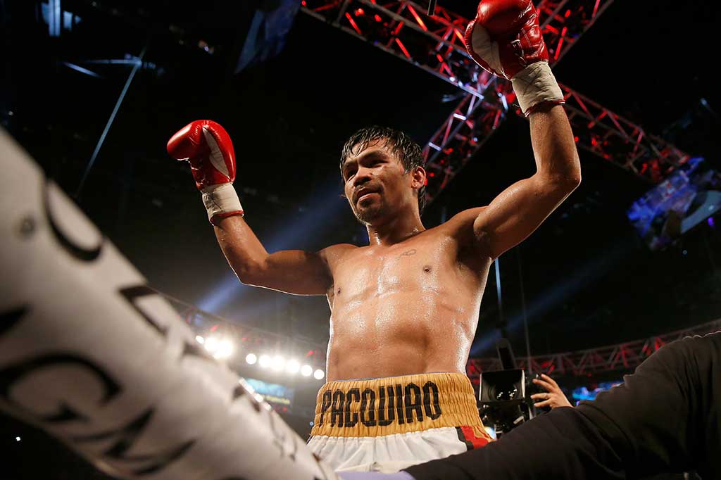 Pacquiao Kalahkan Bradley dengan Angka Mutlak