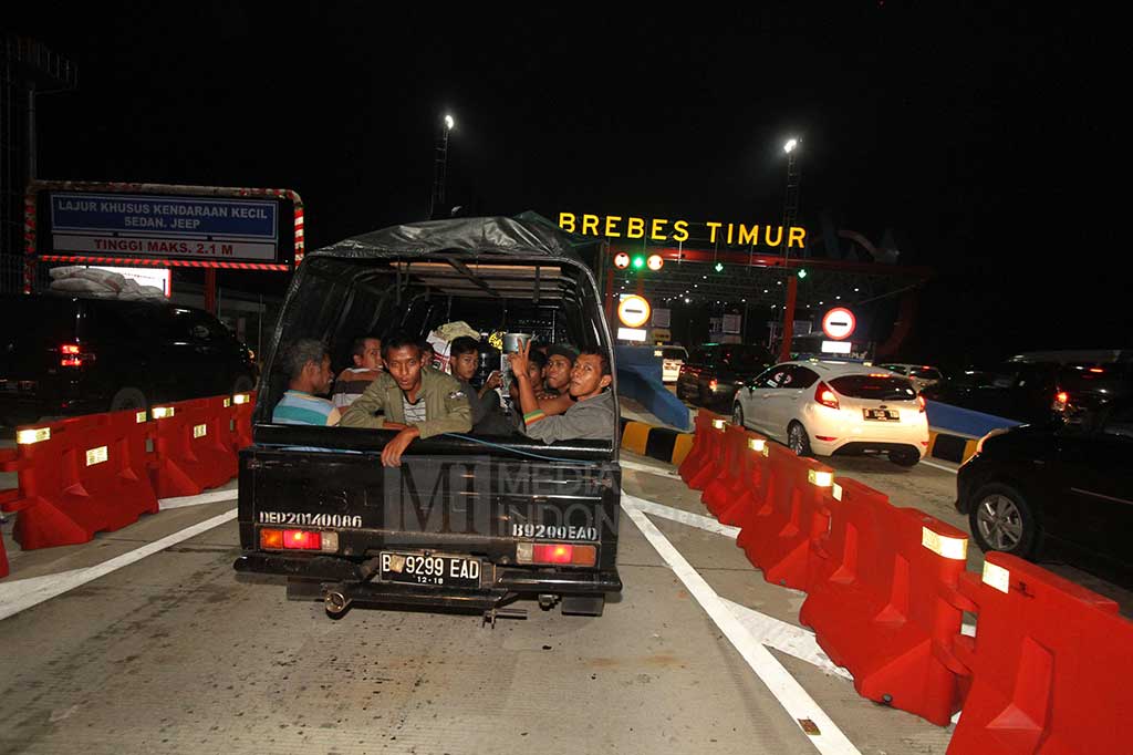 Mudik dengan Mobil Bak Terbuka