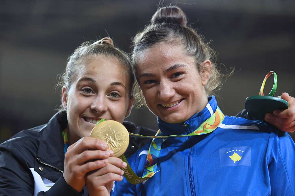 Kelmendi bersama Giuffrida.
