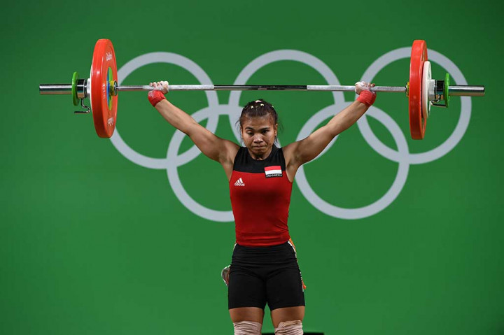 Sri Wahyuni, atlet kelahiran Bandung 13 Agustus 1994, meraih perak setelah mencatat total angkatan 192 kg.