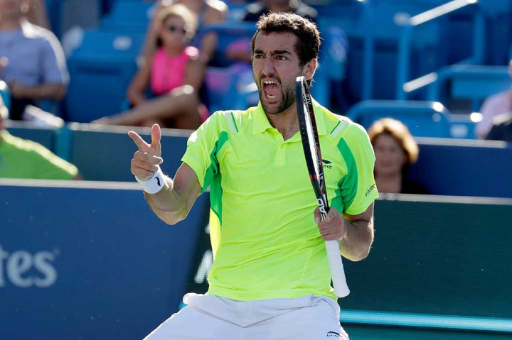 Unggulan ke-12 Marin Cilic melakukan selebrasi usai menang dua set langsung 6-4 dan 7-5 atas Andy Murray.