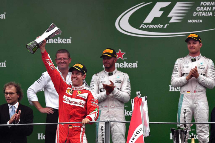 Pembalap Ferrari Sebastian Vettel dan Kimi Raikkonen mencapai finis di posisi ketiga dan keempat pada balapan di negara timnya tersebut.