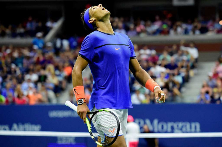 Rafael Nadal tidak dapat menutupi rasa kecewanya setelah ditaklukkan petenis unggulan 24 Lucas Pouolle.