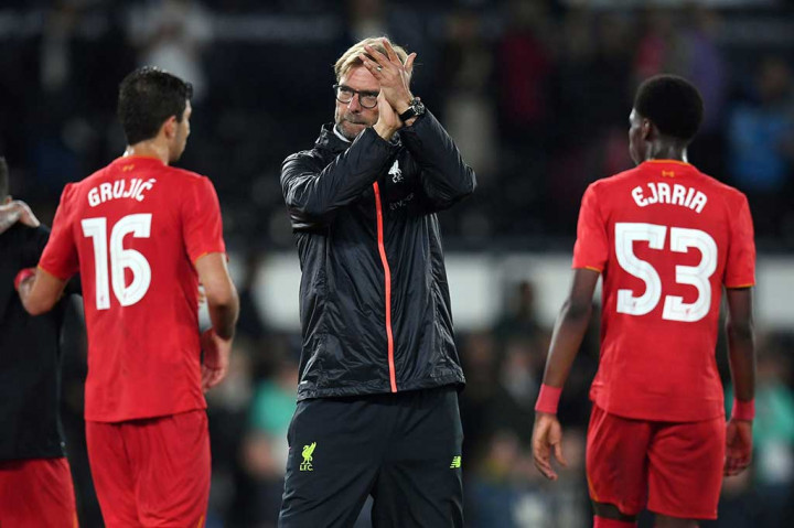 Manajer Liverpool Jurgen Klopp menyambut gembira kemenangan timnya atas Derby. 