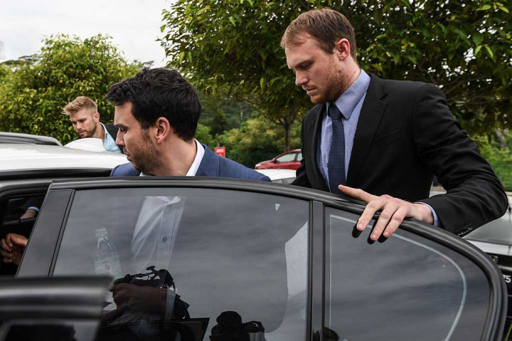 Empat hari setelah penangkapan, sembilan penggemar balap tersebut dibawa ke pengadilan Malaysia untuk menghadapi tuduhan potensi ketidaksenonohan di depan publik dan penghinaan nasional.