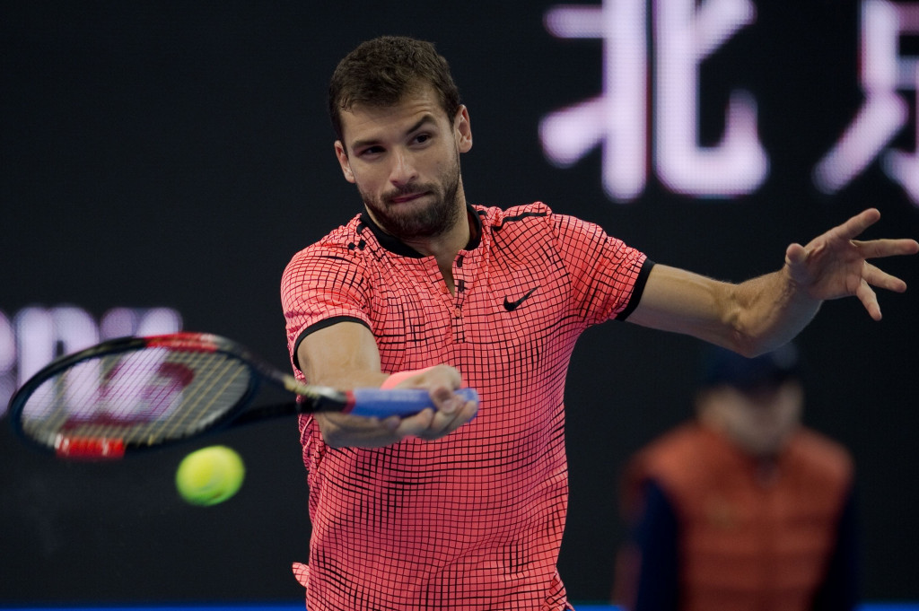 Petenis Bulgaria Grigor Dimitrov melawan Petenis Inggris Raya Andy Murray melawan dalam final Tiongkok Terbuka 2016