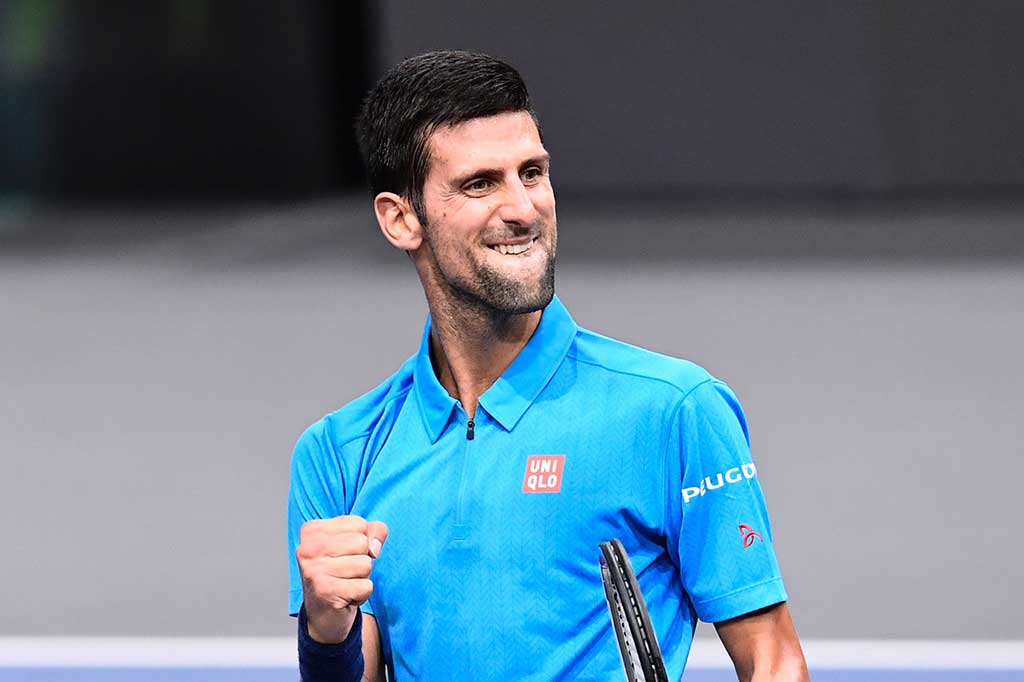 Djokovic melakukan selebrasi usai mengalahkan Dimitrov.