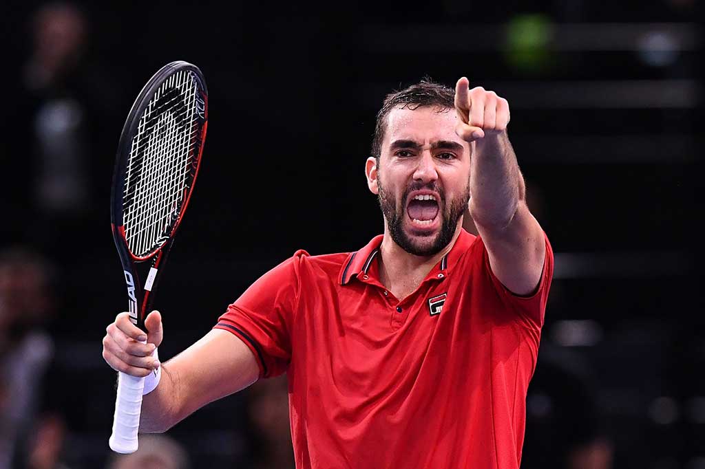 Marin Cilic (Kroasia) meluapkan kegembiraannya setelah menundukkan Djokovic.