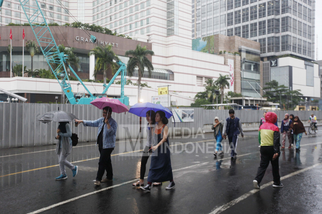 Sempat Diguyur Hujan, CFD tak Seramai Biasanya