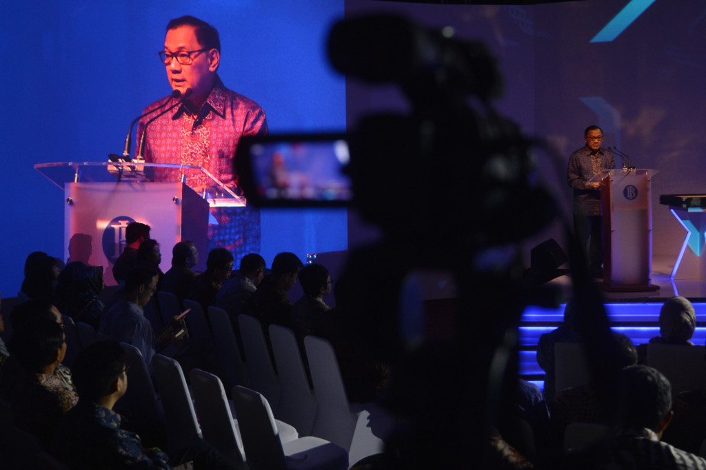 Gubernur Bank Indonesia Agus Martowardojo memberikan sambutan sebelum meresmikan BI Fintech Office di Jakarta, Senin (14/11/2016)