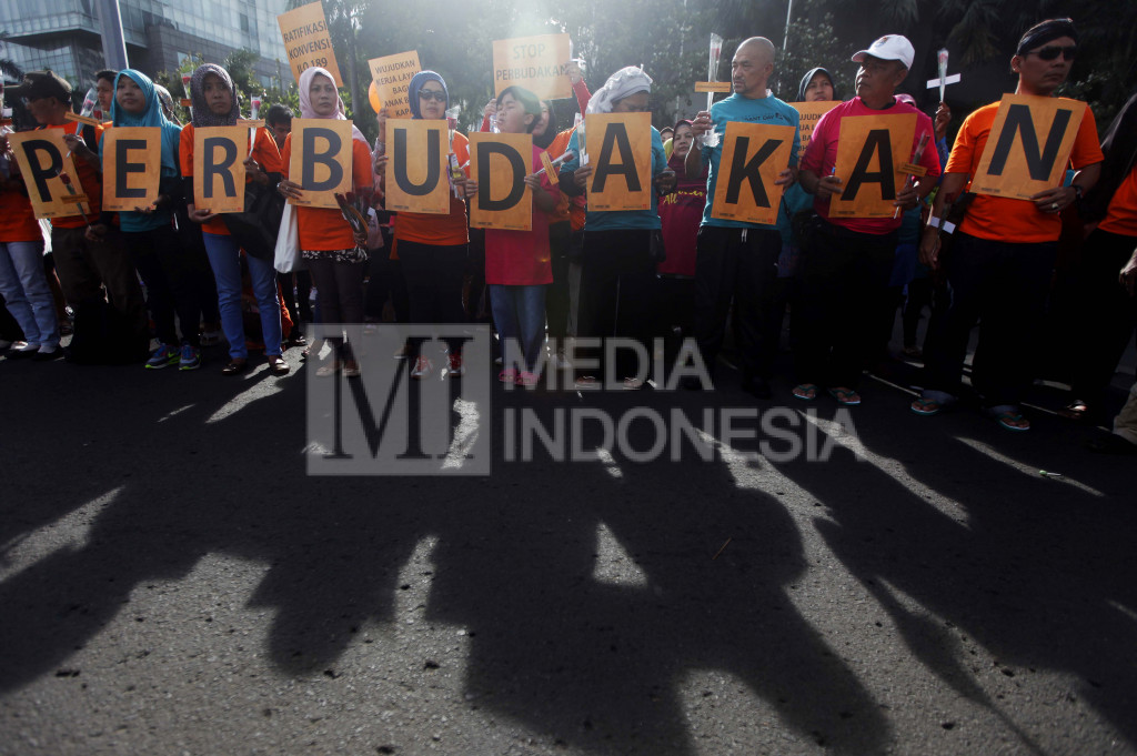 Puluhan Buruh Gelar Aksi Peringatan Hari Migran Internasional