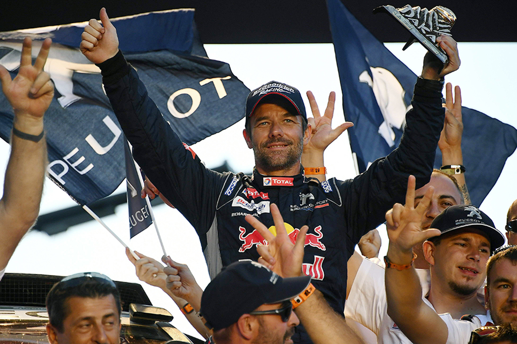 Pereli tim Peugeot itu meraih gelar usai mengalahkan rekan setim sekaligus legenda Kejuaraan Reli Dunia (WRC), Sebastien Loeb.