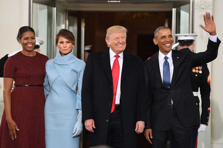 Obama dan Michelle berfoto bersama Trump dan Melania. AFP/Jim Watson