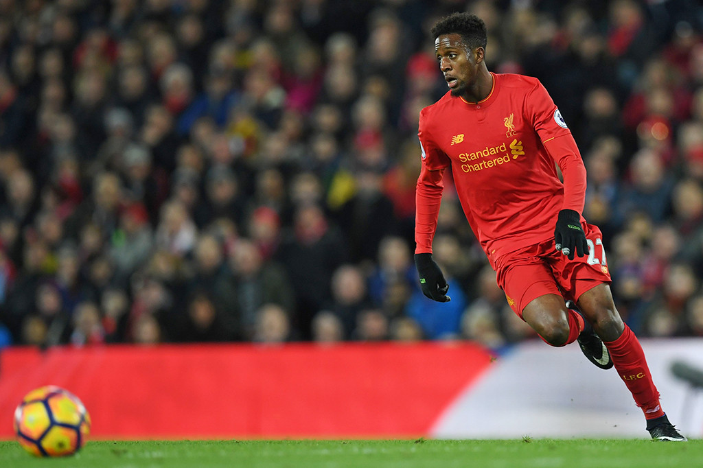 Tuan rumah baru bisa memperkecil ketertinggalan di menit-menit akhir babak kedua lewat Divock Origi.