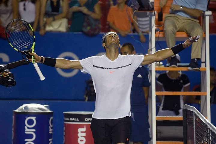 Nadal melakukan selebrasi setelah mengalahkan Cilic dua set langsung 6-1, 6-2.