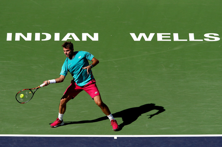 Federer menang dua set langsung atas rekan senegaranya dari Swiss,  Stan Wawrinka, 6-4 dan 7-5. AFP/Matthew Stockman