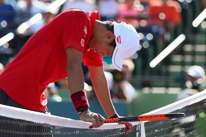 Nishikori tertunduk lesu setelah dikalahkan Fognini.