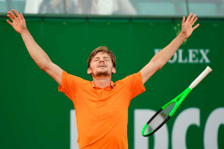 Goffin melakukan selebrasi usai menundukkan Djokovic, untuk bertemu Rafael Nadal di semifinal.
