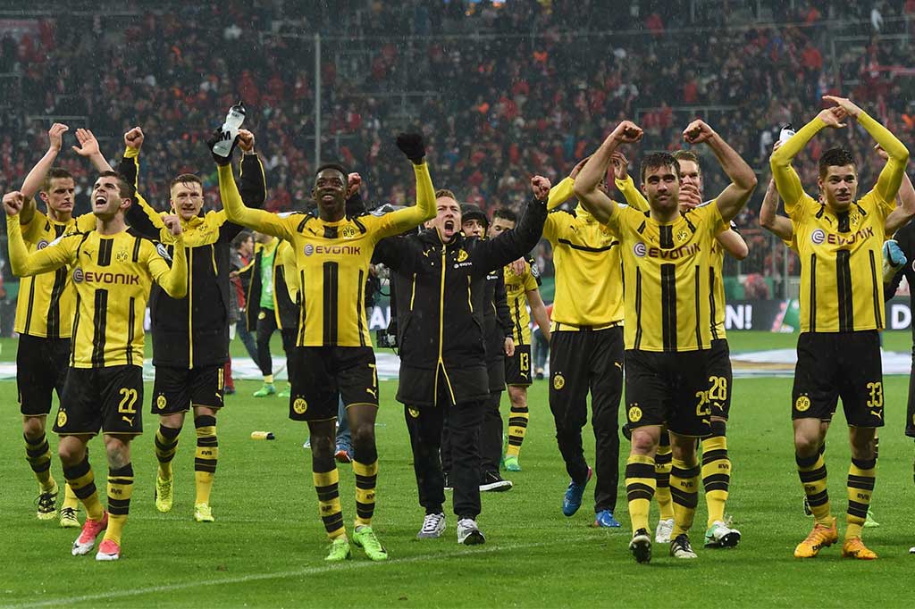 Dortmund di final akan menghadapi Eintracht Frankfurt yang mengalahan Borussia Moenchengladbach lewat babak adu penalti.
