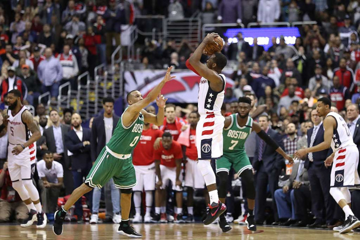 Poin guard John Wall menjadi pahlawan Washington Wizards dengan tembakan tiga angkanya saat laga menyisakan 3,5 detik untuk membawa timnya menang 92-91 atas Boston Celtics di game keenam semifinal Wilayah Timur NBA, Sabtu (13/5/2017) WIB.