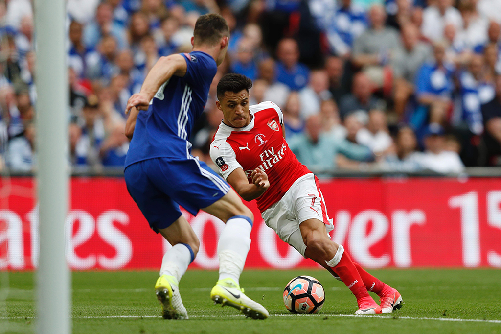 Arsenal berhasil membuka keunggulan saat pertandingan baru berjalan empat menit lewat Alexis Sanchez.