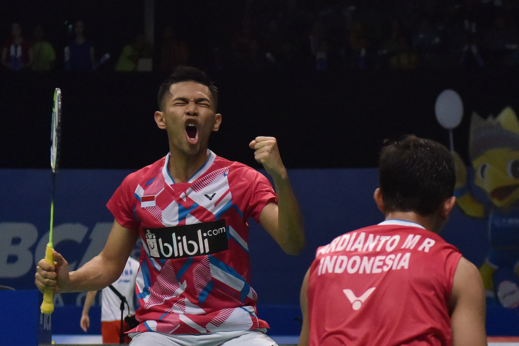 Fajar Alfian/Muhammad  Rian Ardianto meluapkan kegembiraan usai mengalahkan rekan senegaranya Ricky Karanda dan Angga Pratama 21-17, 17-21, 21-15. 