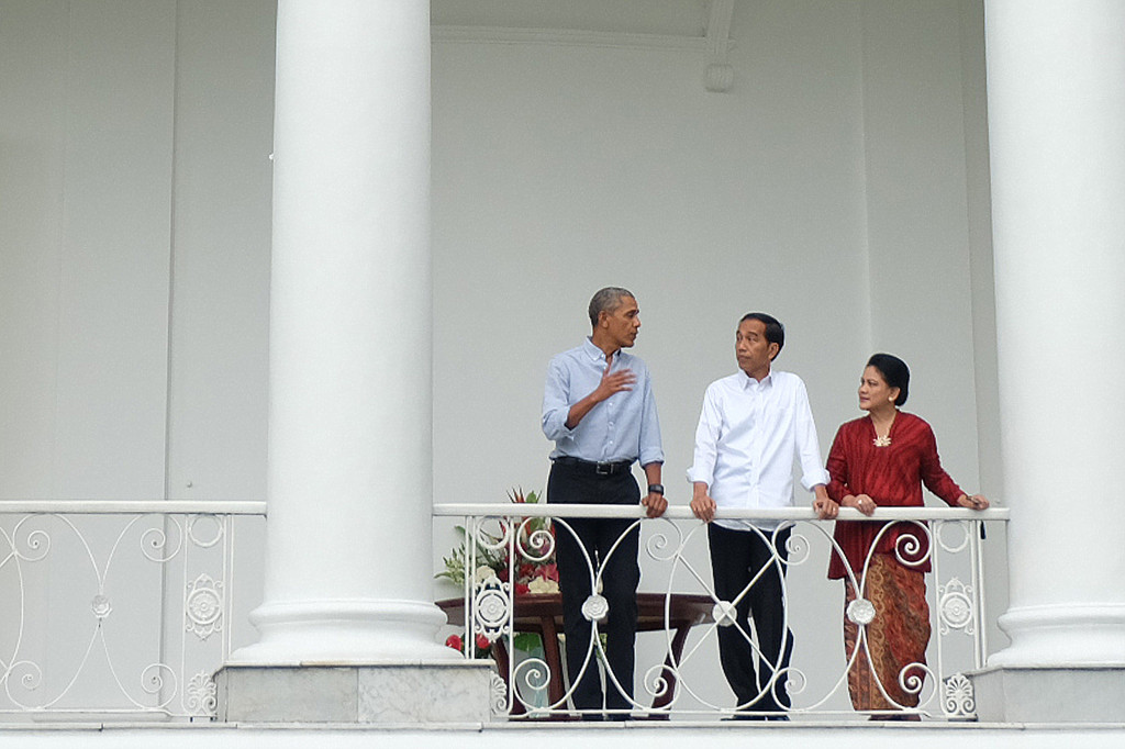 Obama ketika disambut Jokowi dan keluarga di Istana Bogor. Sebelumnya Obama sekeluarga berlibur di Bali dan Yogyakarta. ANTARA FOTO/Desca Lidya Natalia