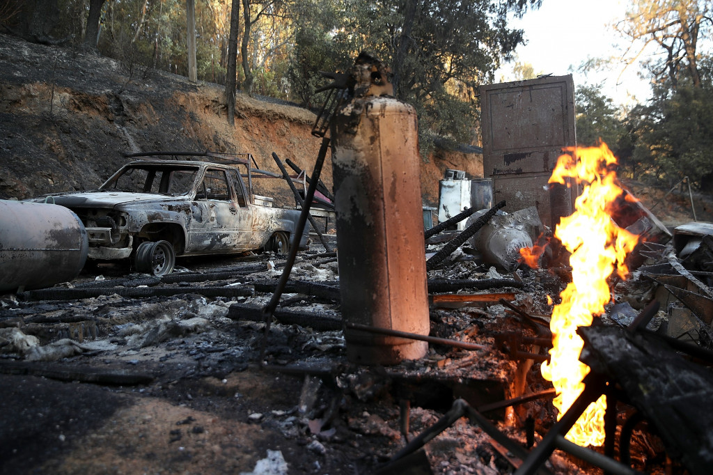 Kebekaran besar ini adalah pertama dalam lima tahun terakhir. Api yang berkobar dipicu oleh serangan hawa panas selama beberapa pekan terakhir. Justin Sullivan/Getty Images/AFP