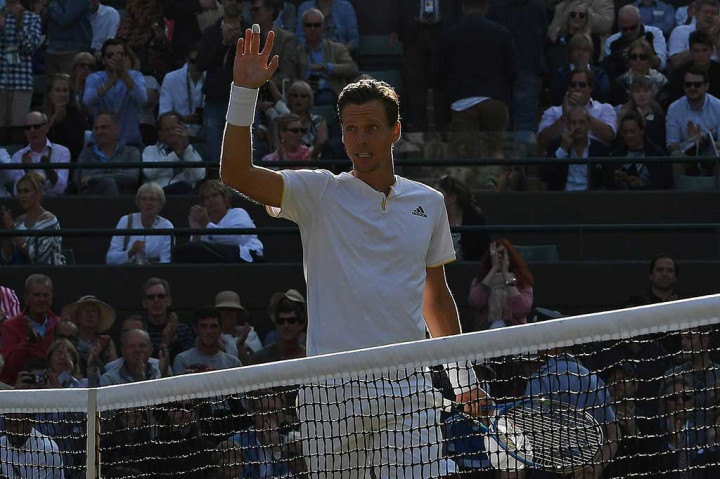 Sementara itu hasil ini membuat Berdych (31) mencapai semifinal untuk tahun kedua. Petenis Ceko itu juga mematahkan rentetan 12 kekalahan melawan Djokovic. Berdych hanya menang sebanyak dua kali dari 27 pertandingan melawan Djokovic.  AFP/Glyn Kirk