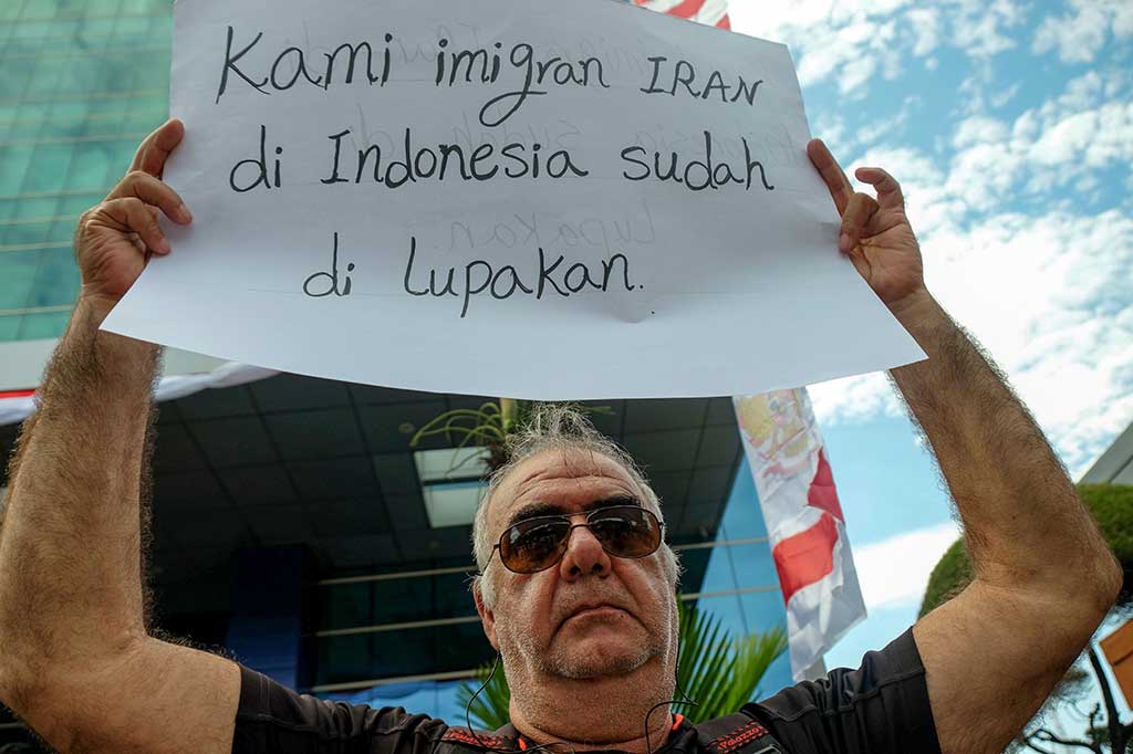 Unjuk rasa digelar untuk menutut kepastian kepada UNHCR agar segera memberangkatkan mereka ke negara ketiga. AFP/Yusuf