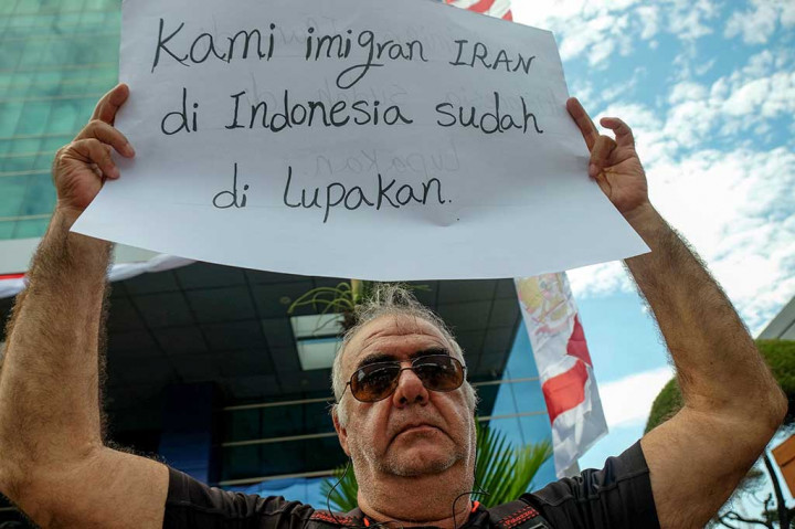 Unjuk rasa digelar untuk menutut kepastian kepada UNHCR agar segera memberangkatkan mereka ke negara ketiga. AFP/Yusuf