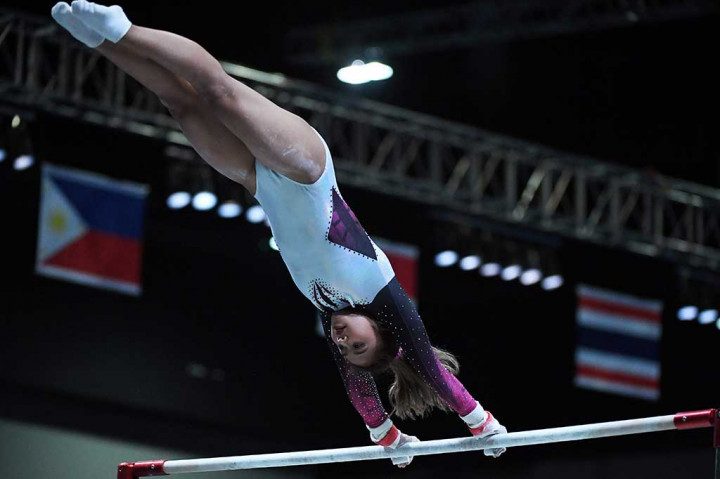 Rifda juga meraih perunggu untuk nomor palang bertingkat dengan total 12.075. Sementara atlet Filipina De Guzman meraih medali emas dengan 12.875 dan perak diraih atlet Malaysia Tracie Ang dengan total 12.550. AFP/Adek Berry