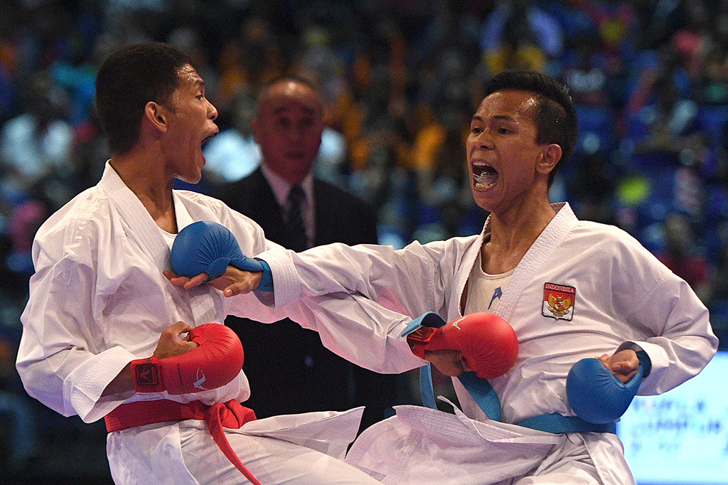 Iwan meraih medali emas setelah menang telak 10-4 atas karateka Filipina, John Paul Bejar pada nomor kumite -55 kilogram di Kuala Lumpur Convention Centre.