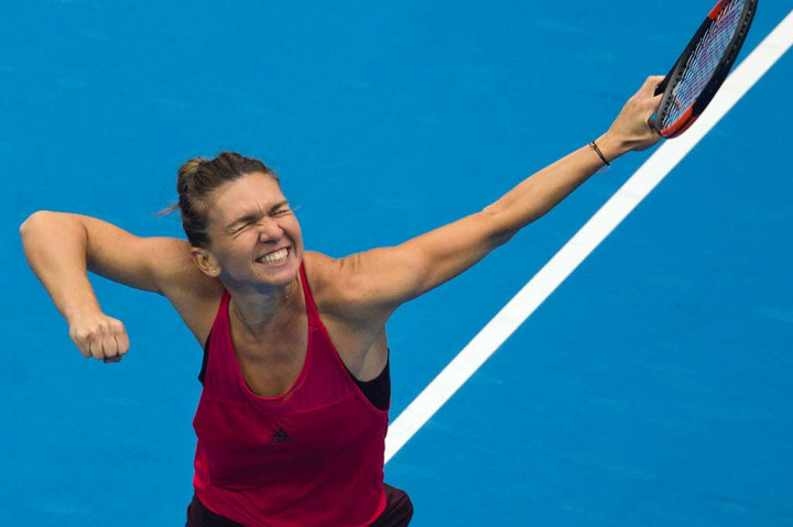 Bagi Halep, kemenangan ini juga menjadi ajang balas dendam setelah dikalahkan Ostapenko di final Prancis Terbuka awal tahun ini. (AP/Ng Han Guan